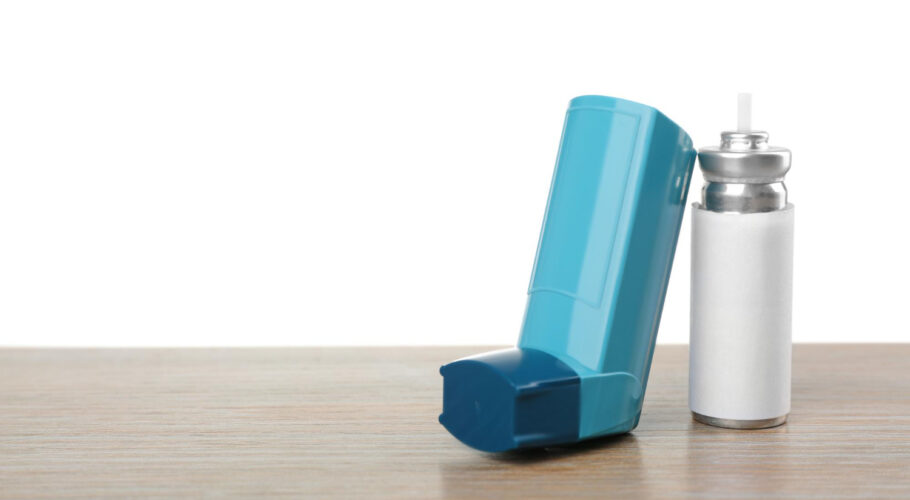 asthma inhaler wooden table