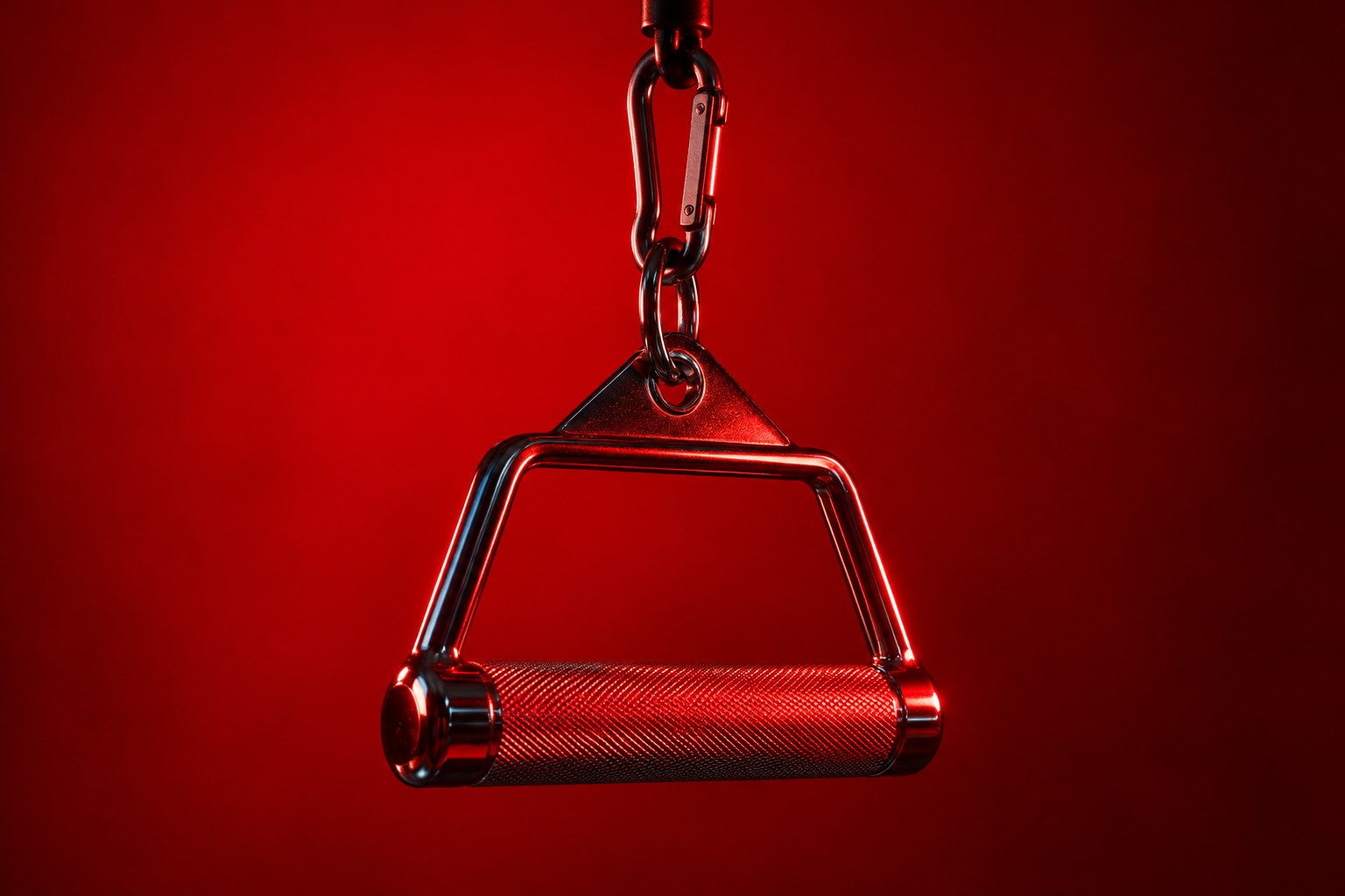 A chrome barbell loaded with weight plates on a padded gym bench