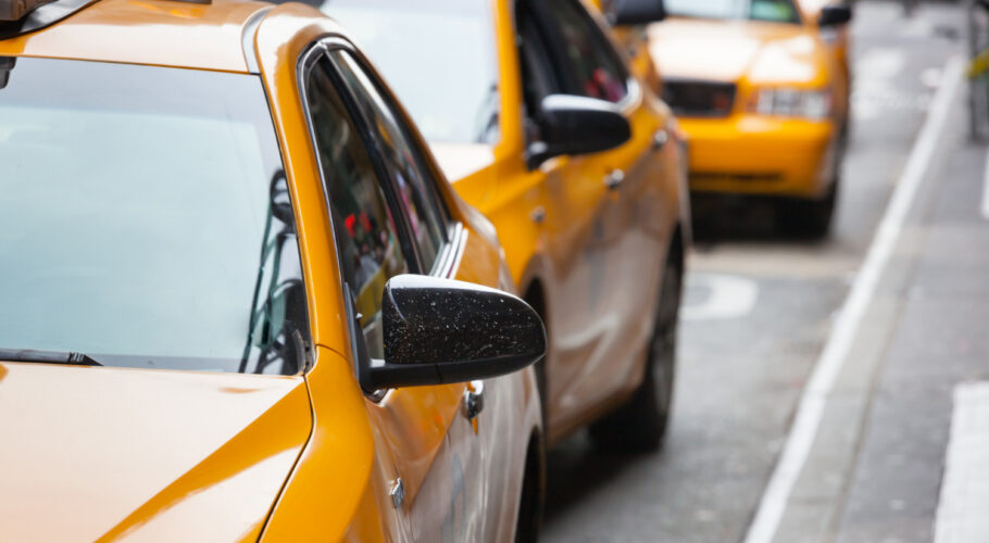 classic street view of taxi cabs waiting to pick up customers