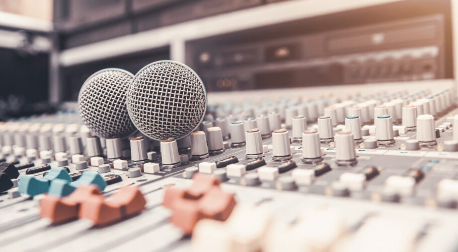 close up microphone is placed professional audio mixer studio