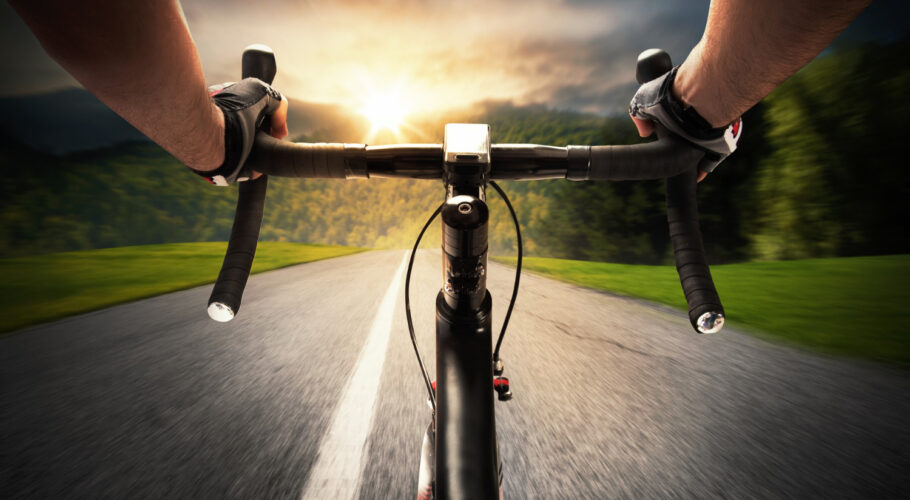 cyclist pedaling on the street in daylight