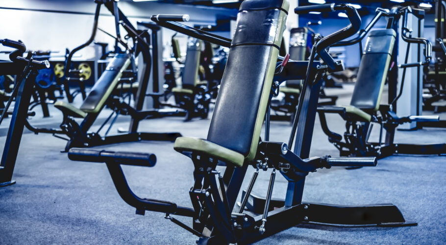 fitness bodybuilder machine shoulders gym