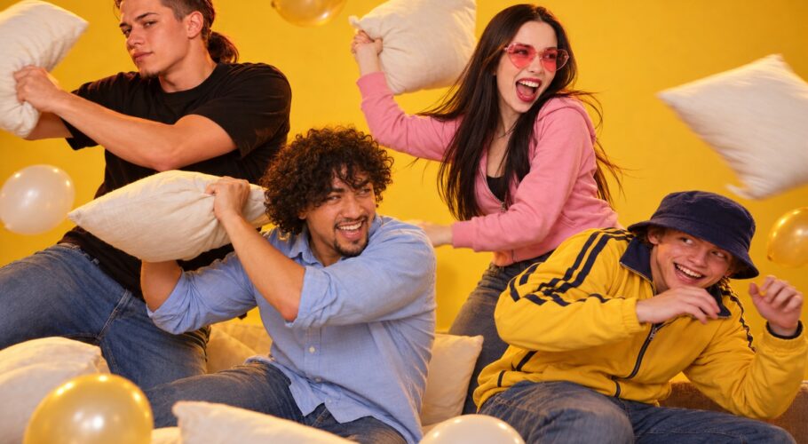 Tony, Tamsen in pink glasses, Ralf and Shawn in a cushion fight