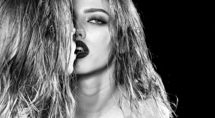 girl is looking mirror young sexy woman with red lips pretty face long hair looking