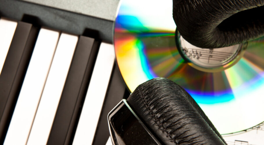 headphone placed synth composing new music lyrics