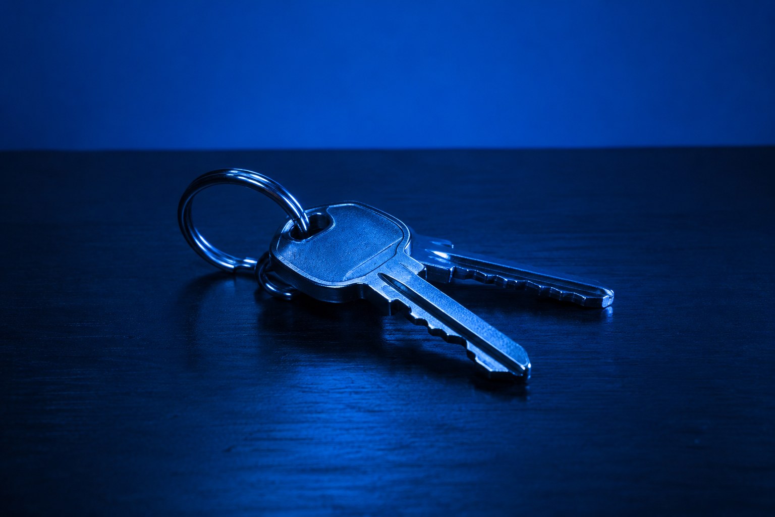 A plain set of metal car keys on a ring