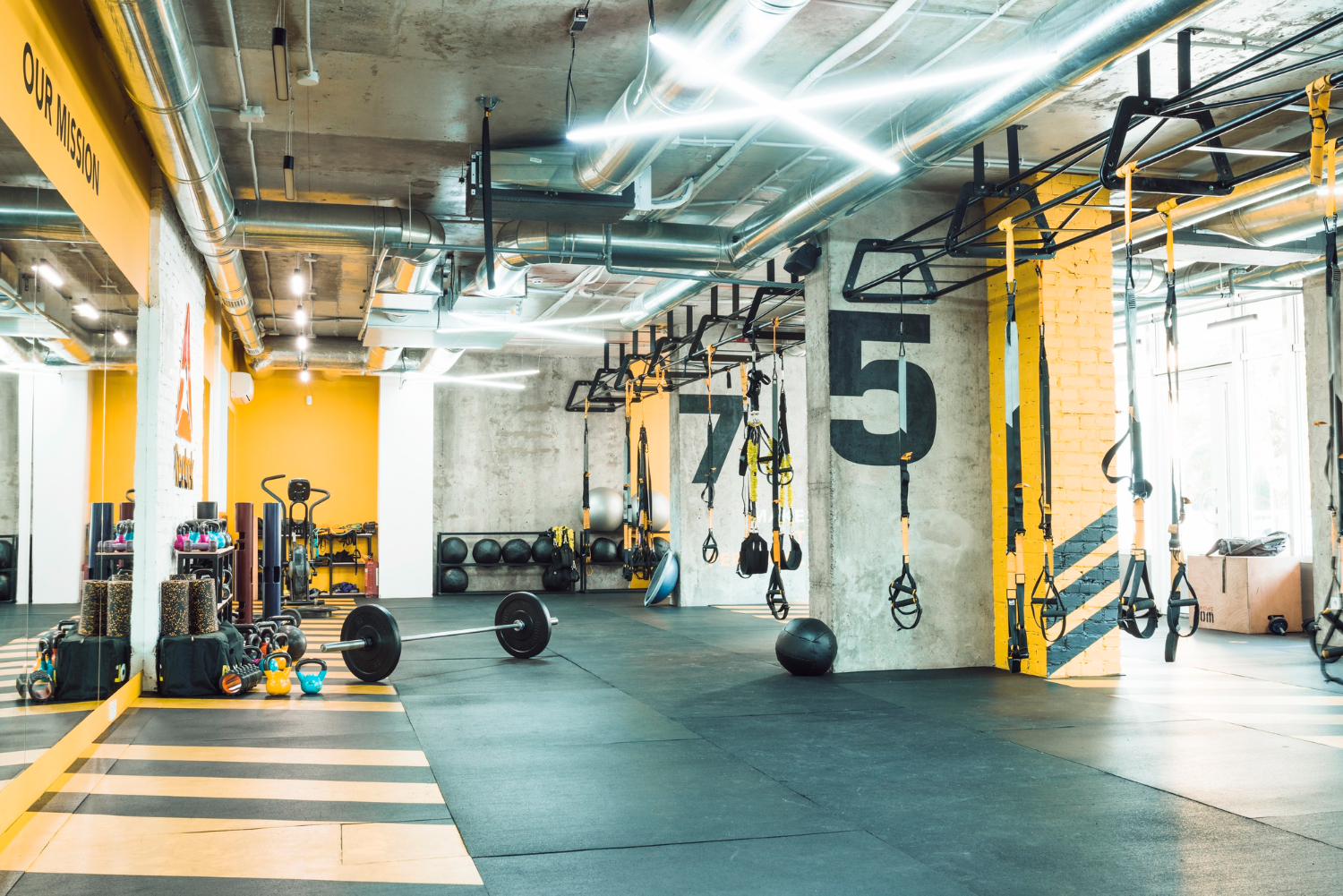 modern gym interior with bodybuilding exercise equipment