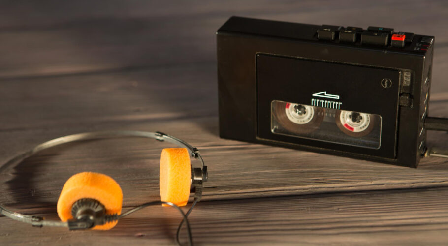 old portable cassette player headphones wooden