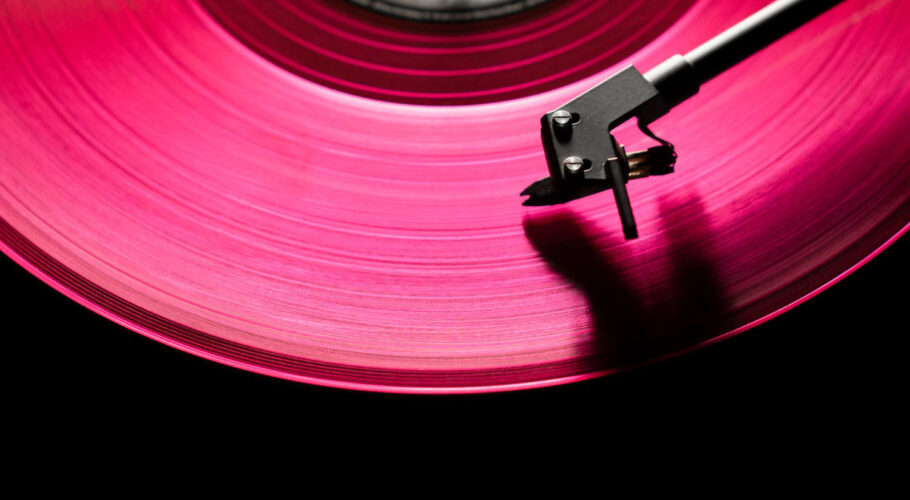 pink vinyl disc close up rap hip hop music black background