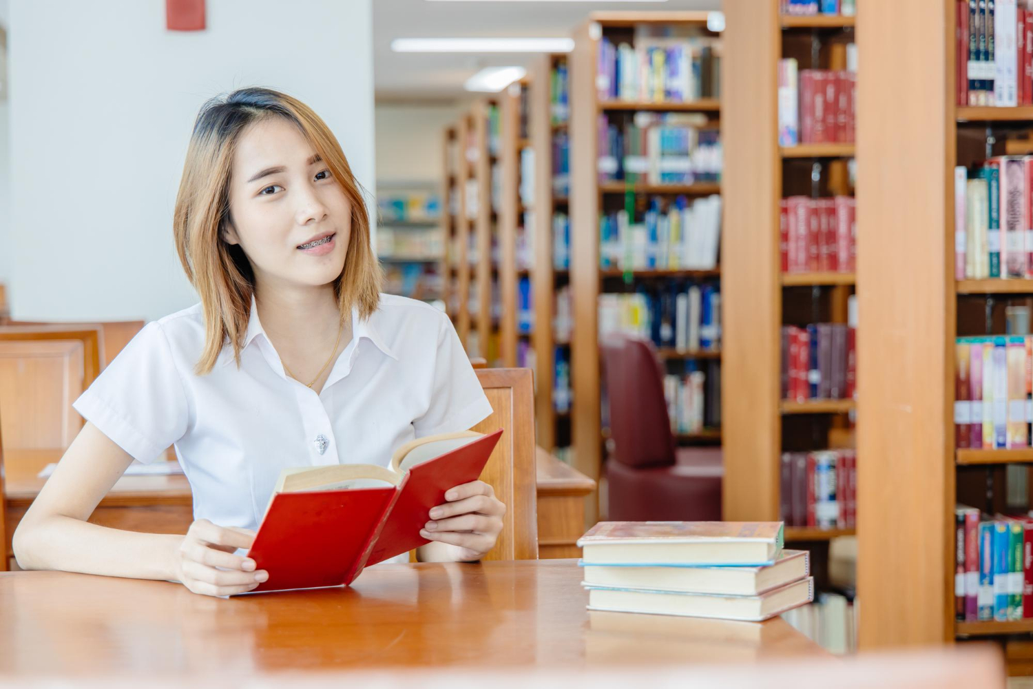 portrait asian university teen girl library happy smile china