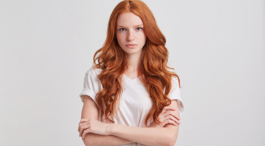 portrait cheerful pretty redhead young woman with long wavy hair