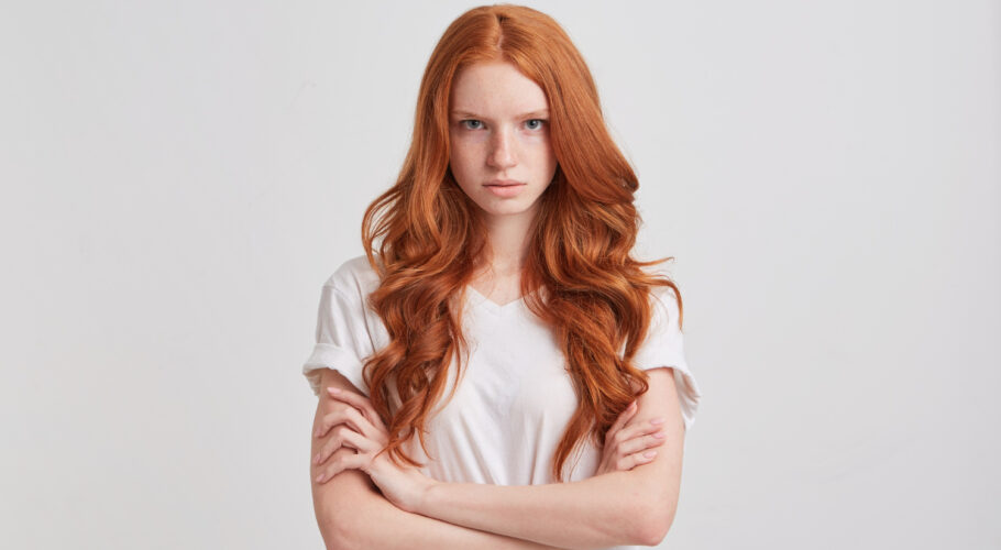 portrait cheerful pretty redhead young woman with long wavy hair kathryn looking upset