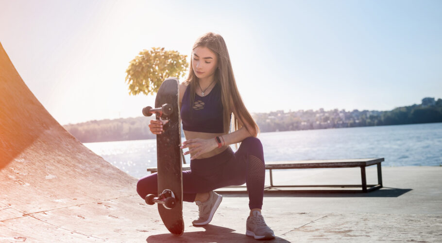 teenager girl ride her skateboard healthy lifestyle
