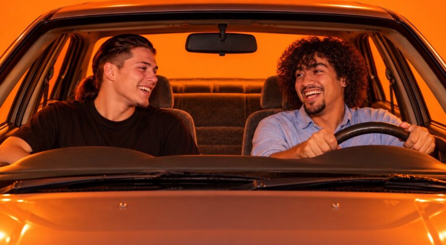 Tony in the passenger seat laughing with Ralf driving his Commodore, March 1999