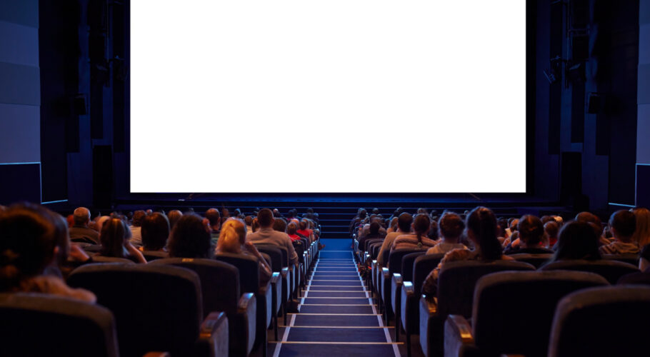 white cinema screen with audience